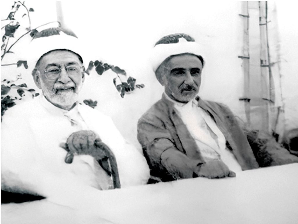 Archive photograph: two men seated in traditional Saudi dress
